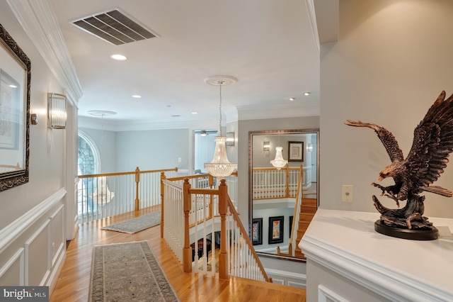 5026 Huntwood Manor Dr, Fairfax, VA 22030 - hall featuring an upstairs landing, ornamental molding, light wood finished floors, and recessed lighting