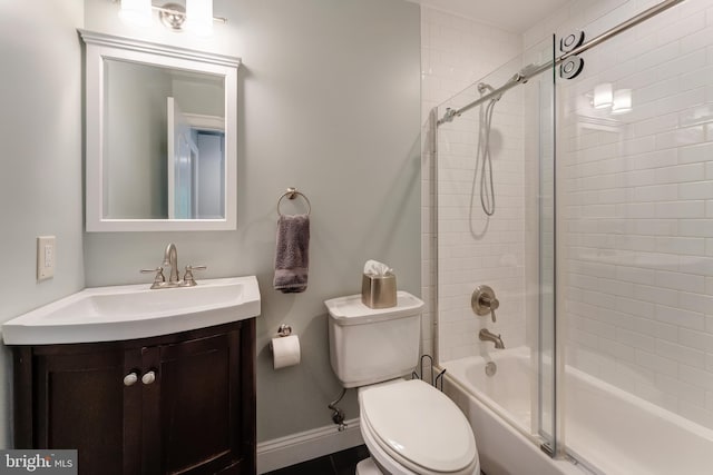 5026 Huntwood Manor Dr, Fairfax, VA 22030 - bathroom with vanity, enclosed tub / shower combo, toilet, and baseboards