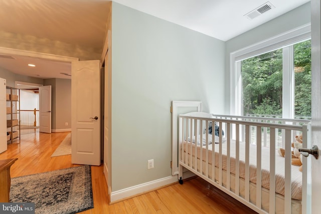 5026 Huntwood Manor Dr, Fairfax, VA 22030 - bedroom featuring wood finished floors, baseboards, and recessed lighting