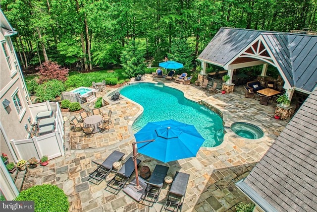 5026 Huntwood Manor Dr, Fairfax, VA 22030 - view of pool with a patio, a gazebo, a pool with connected hot tub, and outdoor dining area
