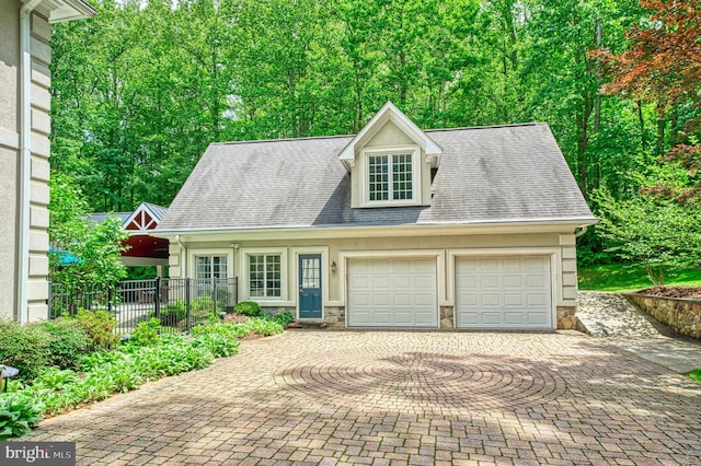 5026 Huntwood Manor Dr, Fairfax, VA 22030 - view of front of home with an attached garage, decorative driveway, stone siding, and a shingled roof