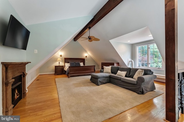 5026 Huntwood Manor Dr, Fairfax, VA 22030 - living area with light wood-type flooring, a lit fireplace, a ceiling fan, and baseboards