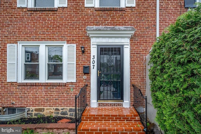 307 W 32nd St, Wilmington, DE 19802 - doorway to property with brick siding