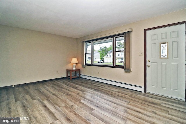 50 Nautilus Dr, Barnegat, NJ 08005 - foyer featuring baseboard heating, wood finished floors, and baseboards