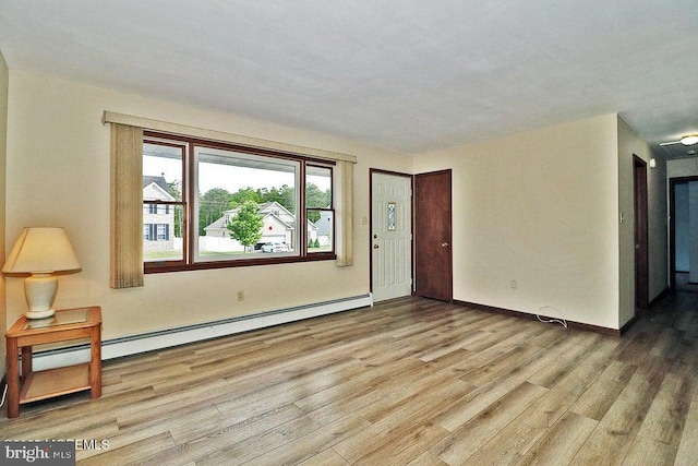 50 Nautilus Dr, Barnegat, NJ 08005 - foyer featuring wood finished floors, a baseboard heating unit, and baseboards