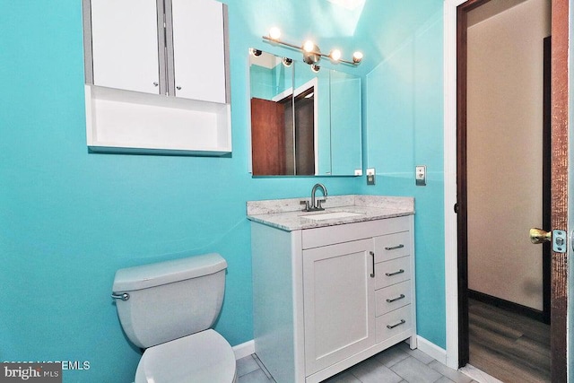 50 Nautilus Dr, Barnegat, NJ 08005 - bathroom featuring vanity, toilet, baseboards, and tile patterned flooring