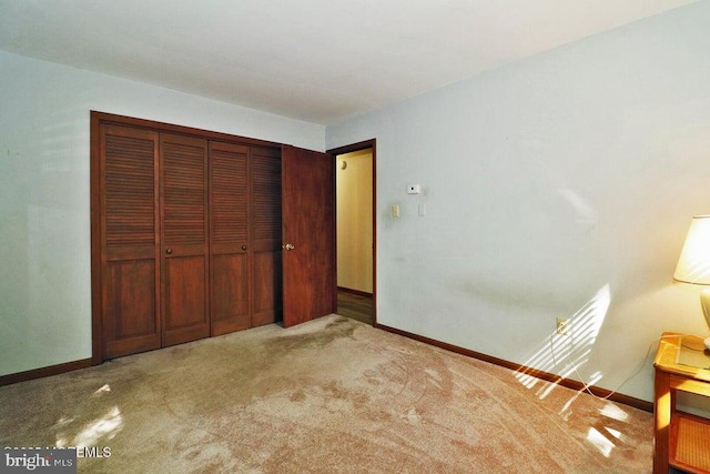 50 Nautilus Dr, Barnegat, NJ 08005 - unfurnished bedroom featuring carpet floors, baseboards, and a closet