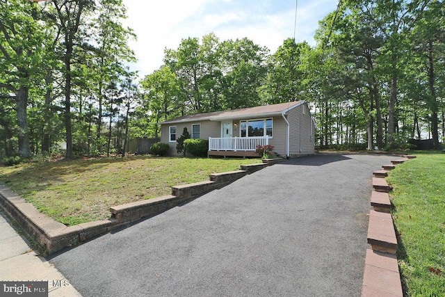 50 Nautilus Dr, Barnegat, NJ 08005 - ranch-style home featuring a front lawn