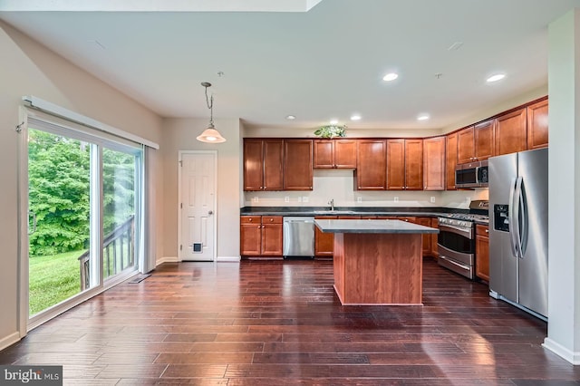 4827 Atlas Cedar Way, Aberdeen, MD 21001 - kitchen with stainless steel appliances, dark wood-style floors, a center island, dark countertops, and recessed lighting
