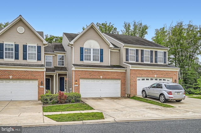 4827 Atlas Cedar Way, Aberdeen, MD 21001 - view of front of house with an attached garage, concrete driveway, and brick siding