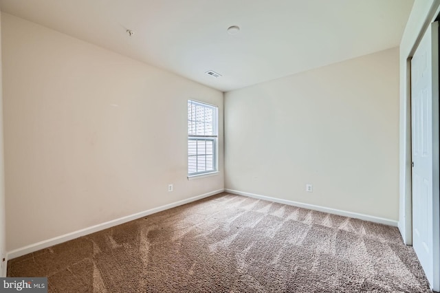 4827 Atlas Cedar Way, Aberdeen, MD 21001 - unfurnished bedroom with carpet floors, baseboards, and a closet