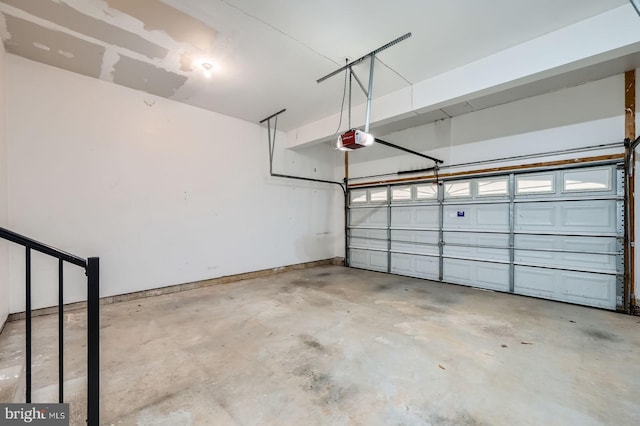 4827 Atlas Cedar Way, Aberdeen, MD 21001 - garage featuring a garage door opener and baseboards