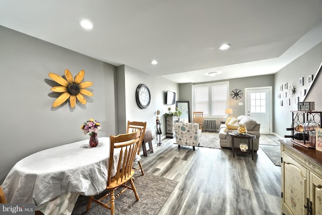 310 E S St, York, PA 17403 - dining area with radiator heating unit, wood finished floors, recessed lighting, and baseboards