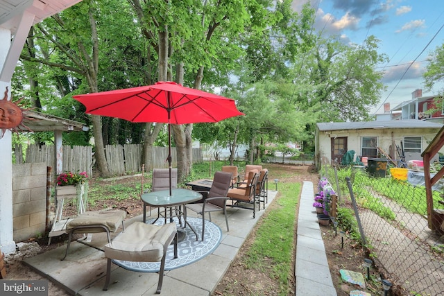 310 E S St, York, PA 17403 - fenced backyard with a patio area