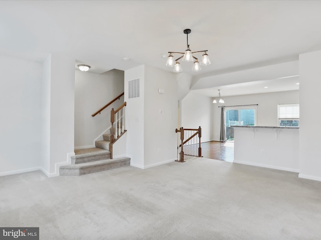 100 Norwood Dr, Falling Waters, WV 25419 - unfurnished living room with a chandelier, carpet floors, and baseboards