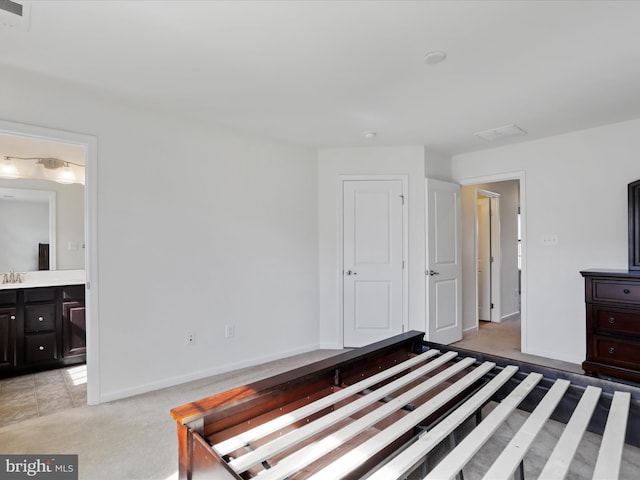 100 Norwood Dr, Falling Waters, WV 25419 - unfurnished bedroom with light colored carpet, baseboards, ensuite bath, and a sink