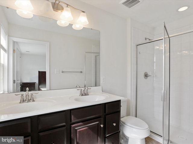100 Norwood Dr, Falling Waters, WV 25419 - bathroom with double vanity, a shower stall, and toilet