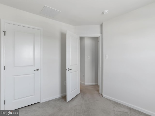 100 Norwood Dr, Falling Waters, WV 25419 - unfurnished bedroom featuring light carpet and baseboards