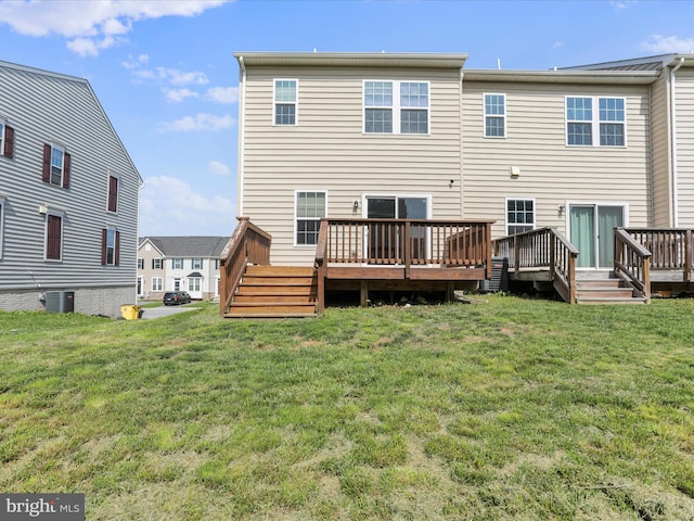 100 Norwood Dr, Falling Waters, WV 25419 - rear view of house with a deck, a lawn, and cooling unit