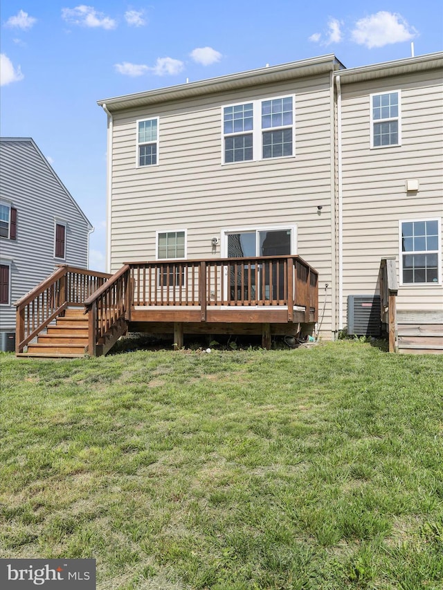 100 Norwood Dr, Falling Waters, WV 25419 - back of property featuring a deck, central AC unit, and a yard