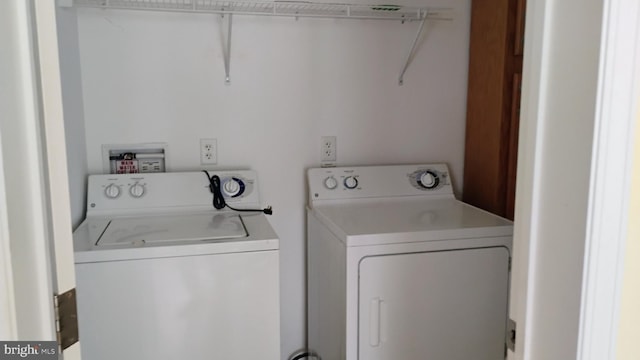 710 Mcginnis Dr Unit 710, Dover, DE 19901 - laundry area featuring washer and dryer