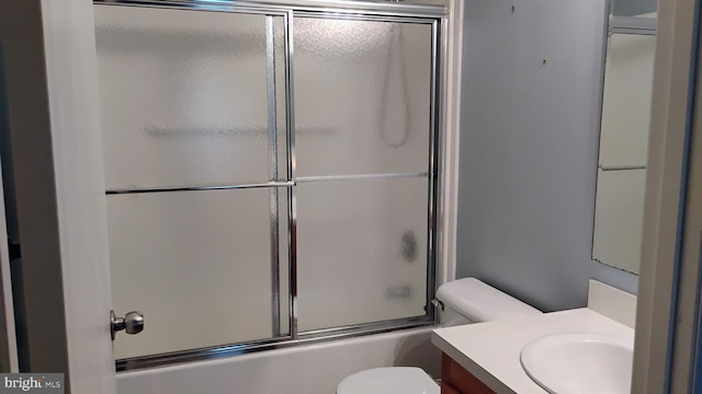 710 Mcginnis Dr Unit 710, Dover, DE 19901 - full bathroom featuring vanity, toilet, and enclosed tub / shower combo
