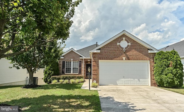 3839 Mulberry Point Ct, Dumfries, VA 22025 - view of front of property with brick siding, an attached garage, driveway, and a front lawn