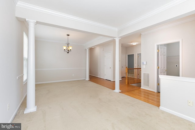 3839 Mulberry Point Ct, Dumfries, VA 22025 - unfurnished room featuring carpet, decorative columns, ornamental molding, a chandelier, and baseboards