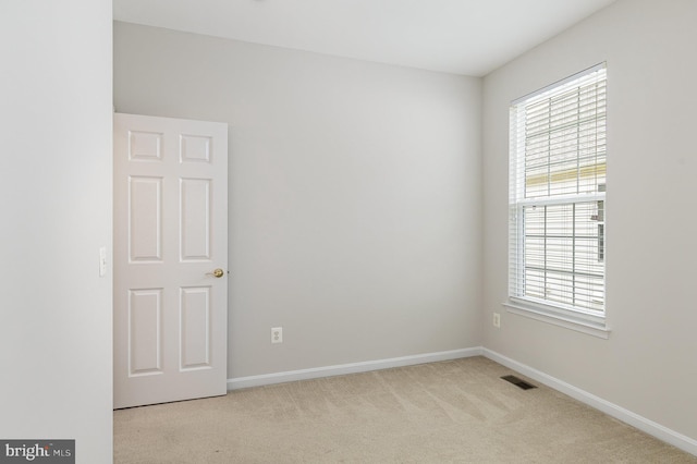 3839 Mulberry Point Ct, Dumfries, VA 22025 - spare room featuring carpet floors, healthy amount of natural light, and baseboards