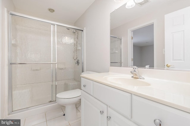 3839 Mulberry Point Ct, Dumfries, VA 22025 - bathroom featuring tile patterned flooring, vanity, toilet, and a stall shower