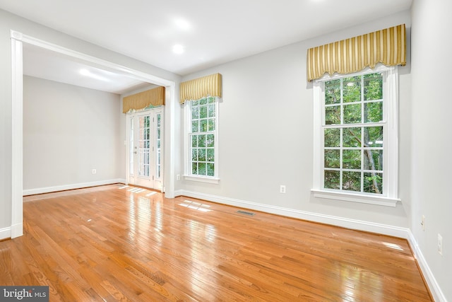 3530 Schuerman House Dr, Fairfax, VA 22031 - unfurnished room with wood-type flooring, baseboards, and french doors