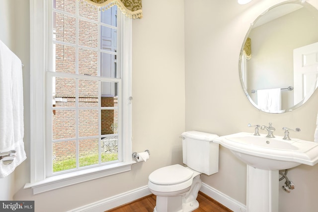 3530 Schuerman House Dr, Fairfax, VA 22031 - half bath with baseboards, wood finished floors, and toilet