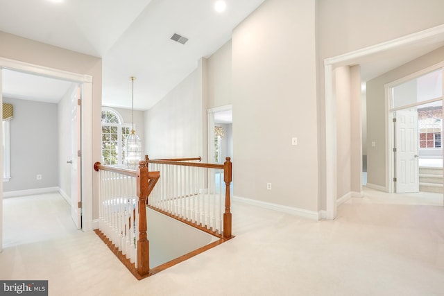 3530 Schuerman House Dr, Fairfax, VA 22031 - hall featuring an upstairs landing, carpet floors, plenty of natural light, and baseboards