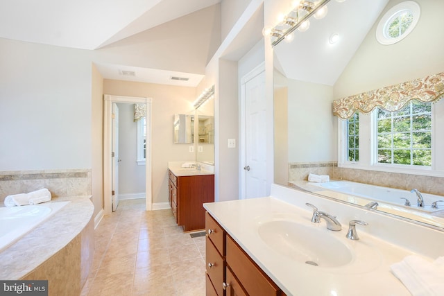 3530 Schuerman House Dr, Fairfax, VA 22031 - bathroom with lofted ceiling, vanity, a garden tub, tile patterned flooring, and baseboards