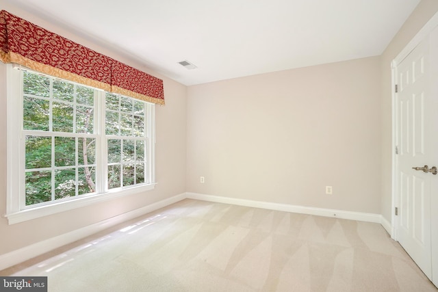 3530 Schuerman House Dr, Fairfax, VA 22031 - unfurnished room with light colored carpet, baseboards, and plenty of natural light
