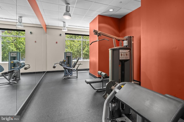 155 Potomac Psge Unit 809, Oxon Hill, MD 20745 - workout area featuring a paneled ceiling and baseboards