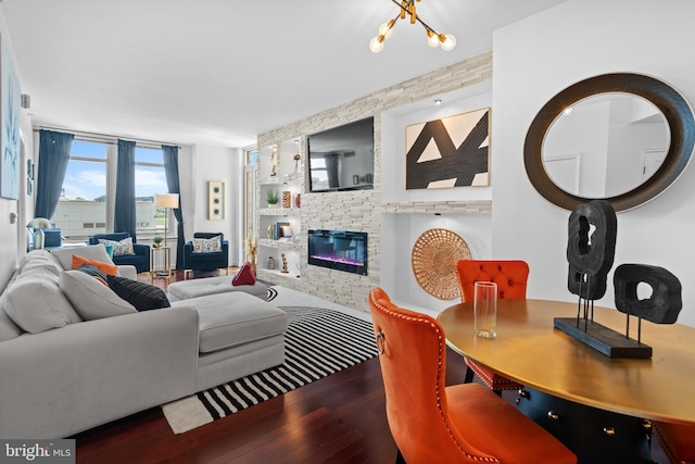 155 Potomac Psge Unit 809, Oxon Hill, MD 20745 - living room with wood finished floors and a stone fireplace
