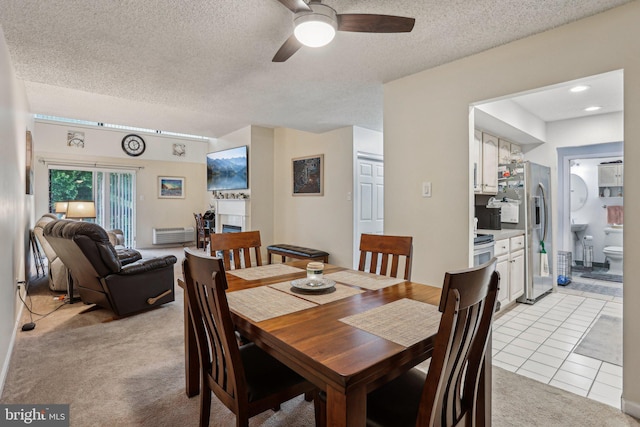700 Avondale Rd Unit Ph-12, Wallingford, PA 19086 - dining room with ceiling fan, a textured ceiling, light colored carpet, and light tile patterned floors