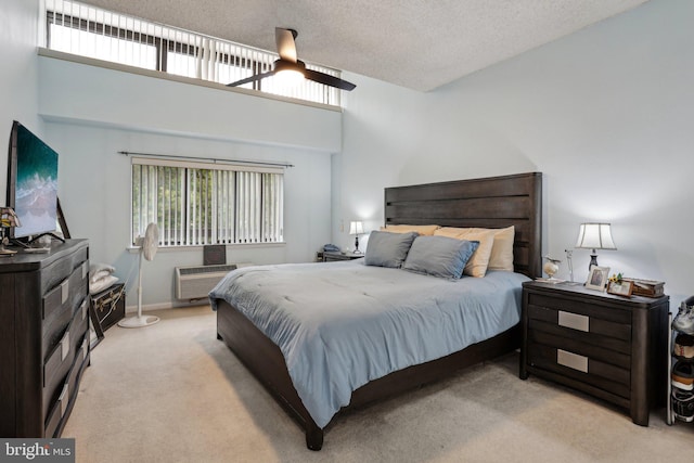 700 Avondale Rd Unit Ph-12, Wallingford, PA 19086 - bedroom with light carpet, multiple windows, a ceiling fan, and a textured ceiling