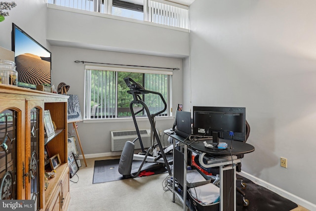 700 Avondale Rd Unit Ph-12, Wallingford, PA 19086 - exercise room featuring baseboards, a wall mounted air conditioner, and carpet flooring