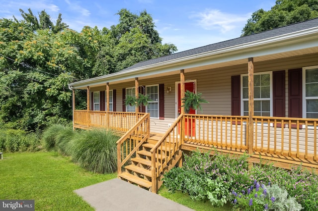 430 Cedar Creek Dr, Harpers Ferry, WV 25425 - ranch-style home featuring covered porch and a front lawn