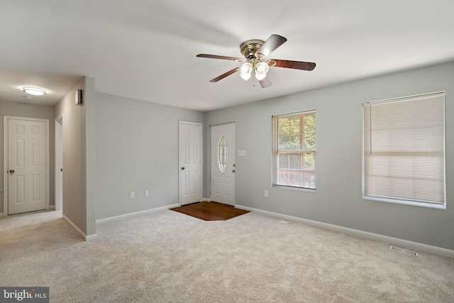 430 Cedar Creek Dr, Harpers Ferry, WV 25425 - entrance foyer with carpet flooring, a ceiling fan, and baseboards