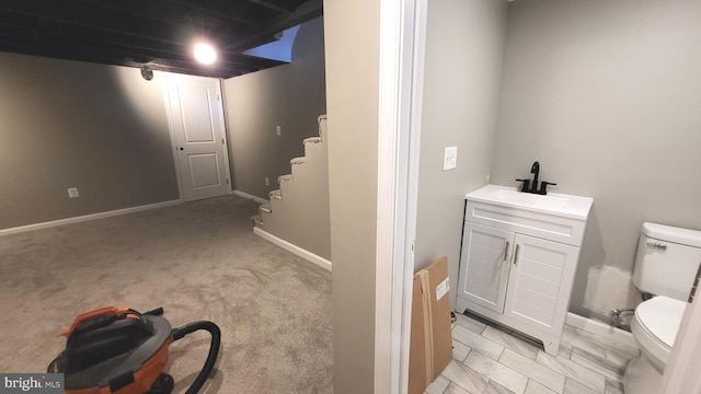 248 W Edgevale Rd, Baltimore, MD 21225 - bathroom featuring toilet, vanity, and baseboards