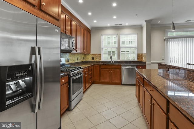 11249 Chase St Unit 100, Fulton, MD 20759 - kitchen featuring stainless steel appliances, a sink, ornamental molding, decorative backsplash, and plenty of natural light