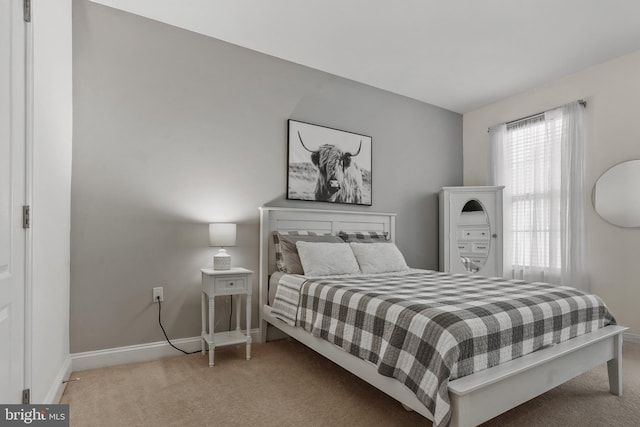 11249 Chase St Unit 100, Fulton, MD 20759 - carpeted bedroom featuring baseboards