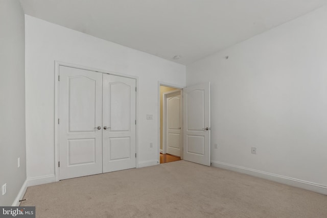 11249 Chase St Unit 100, Fulton, MD 20759 - unfurnished bedroom featuring carpet flooring, baseboards, and a closet