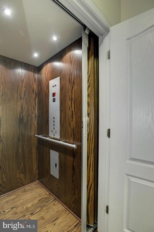 11249 Chase St Unit 100, Fulton, MD 20759 - elevator featuring wood finished floors and recessed lighting