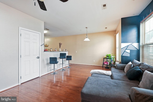 361 Union St, Trenton, NJ 08611 - living area with wood finished floors, a ceiling fan, and a dry bar
