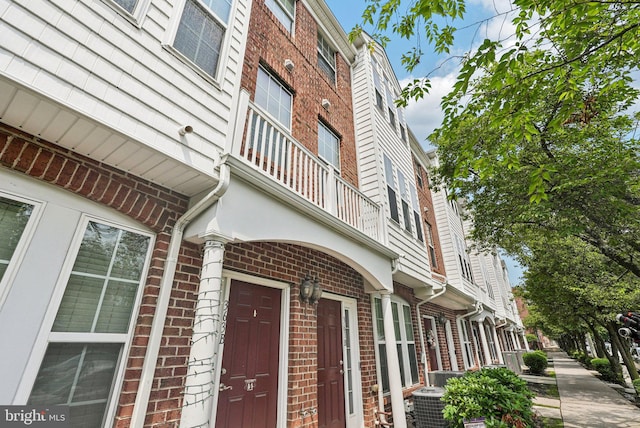 361 Union St, Trenton, NJ 08611 - view of exterior entry with a balcony and brick siding