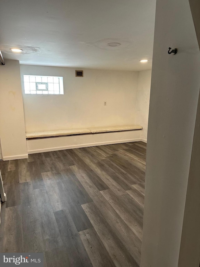 4304 Oakmont St, Philadelphia, PA 19136 - below grade area with dark wood-type flooring and baseboards